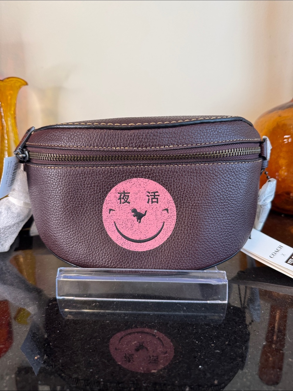 Coach x Yeti Out Oxblood Pebbled Leather Crossbody Bag with Pink Smiley Rexy
